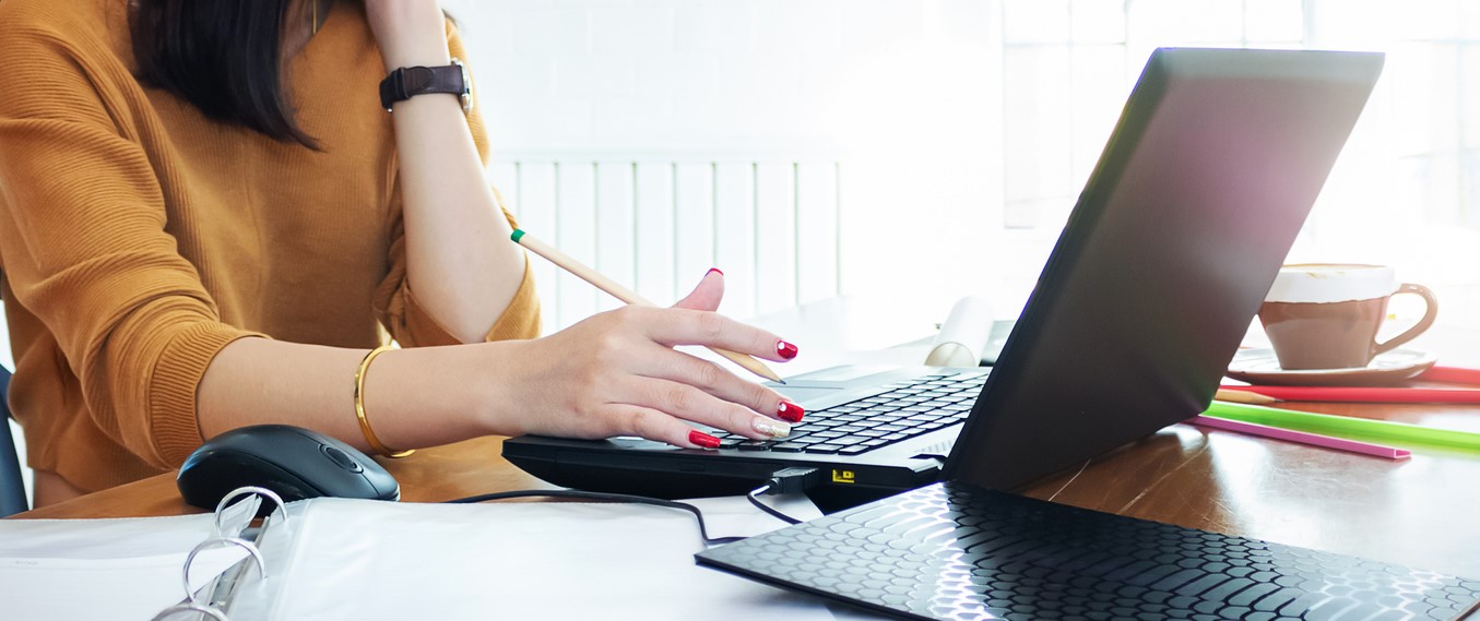 Girl on her computer1355x569.jpg